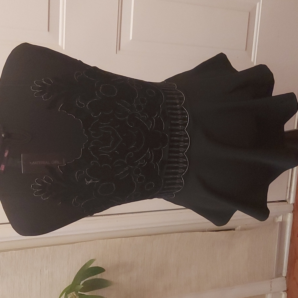 Black NWT  Marerial Girl peplum top with mesh.